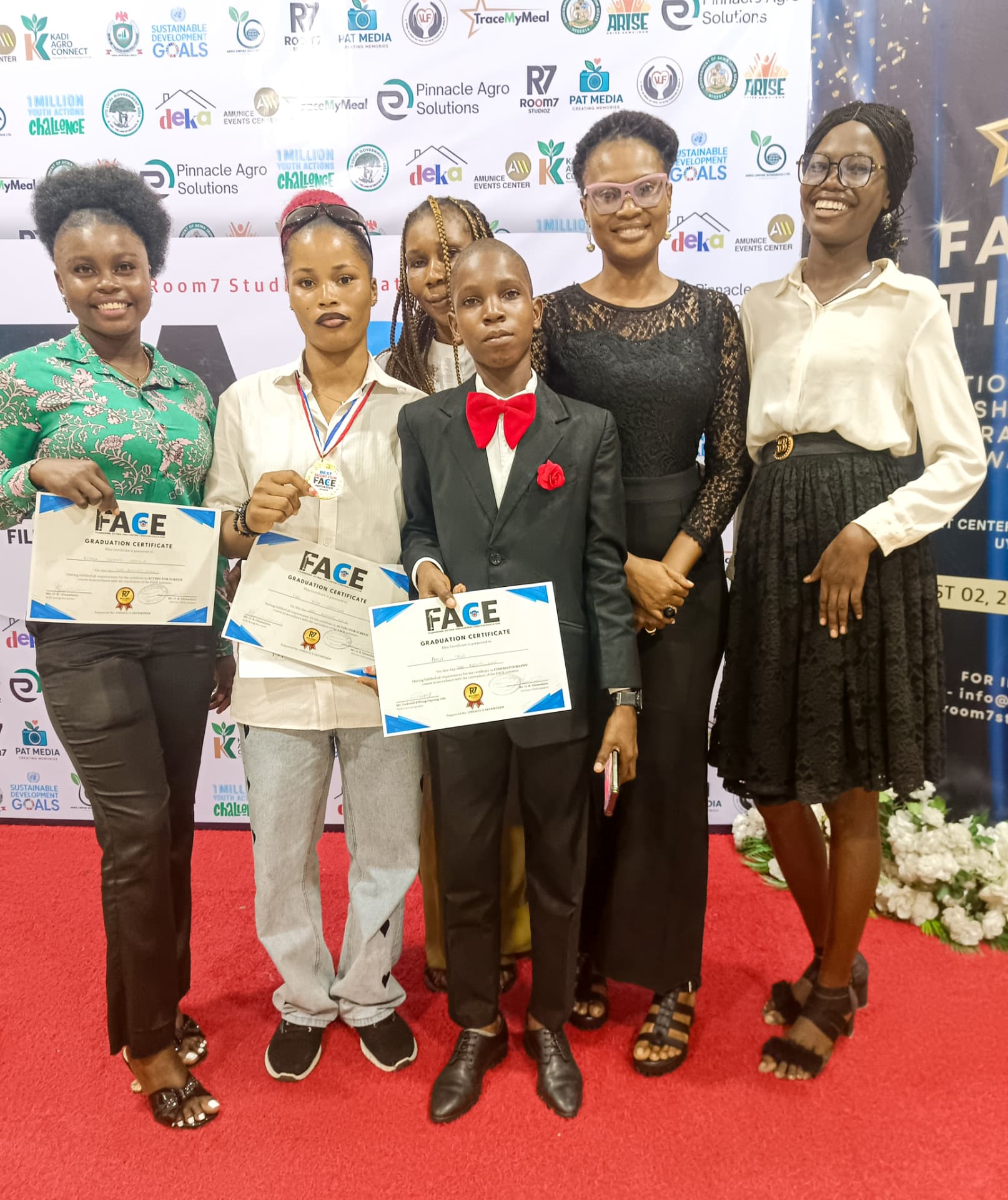 FACE graduates holding their certificates at the FACE 2025 Uyo ceremony